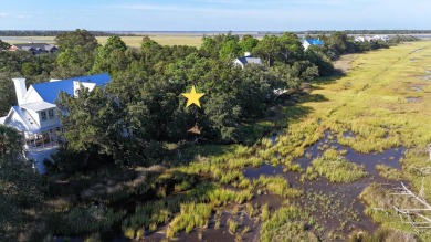 Beautiful vacant lot at almost a third of an acre located on a on Wild Dunes Harbor Golf Resort in South Carolina - for sale on GolfHomes.com, golf home, golf lot