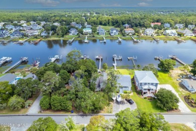 Discover the ultimate coastal living experience on this prime on Founders Club At St. James Plantation in North Carolina - for sale on GolfHomes.com, golf home, golf lot