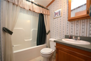Well-maintained 3BR/2BA double-wide in a fantastic community on Winding Creek Executive Course in New York - for sale on GolfHomes.com, golf home, golf lot