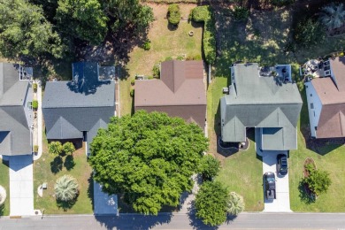 Discover your dream home at 9569 Indigo Club Drive -- a stunning on Indigo Creek Golf Club in South Carolina - for sale on GolfHomes.com, golf home, golf lot