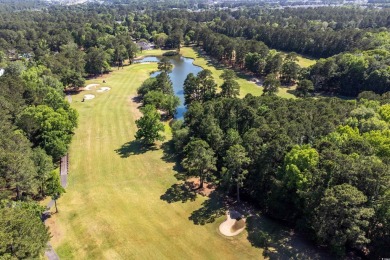 Discover your dream home at 9569 Indigo Club Drive -- a stunning on Indigo Creek Golf Club in South Carolina - for sale on GolfHomes.com, golf home, golf lot