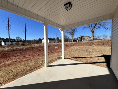 Don't miss this beautiful new ranch home in Clayton's Ashcroft on Riverwood Golf and Athletic Club in North Carolina - for sale on GolfHomes.com, golf home, golf lot