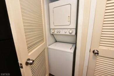 Welcome to this beautifully upgraded end-unit condo in Great on Minerals Golf Club in New Jersey - for sale on GolfHomes.com, golf home, golf lot