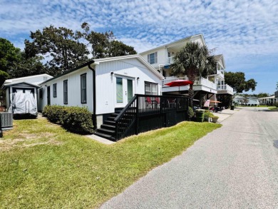 ADORABLE AND VERY SPACIOUS 3 BED/2 BATH BEACH BUNGALOW LOCATED on Prestwick Country Club in South Carolina - for sale on GolfHomes.com, golf home, golf lot