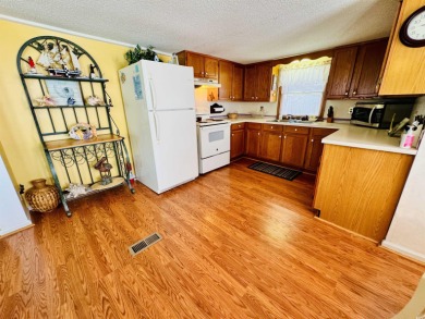 ADORABLE AND VERY SPACIOUS 3 BED/2 BATH BEACH BUNGALOW LOCATED on Prestwick Country Club in South Carolina - for sale on GolfHomes.com, golf home, golf lot