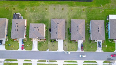 Immaculate 2023 Cali Model in Halifax Plantation. Smart home on Halifax Plantation Golf Club in Florida - for sale on GolfHomes.com, golf home, golf lot