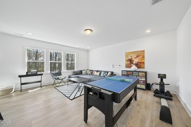 Tucked away on a quiet cul-de-sac in the prestigious Hasentree on Hasentree Club in North Carolina - for sale on GolfHomes.com, golf home, golf lot