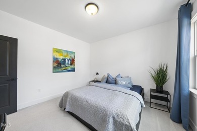 Tucked away on a quiet cul-de-sac in the prestigious Hasentree on Hasentree Club in North Carolina - for sale on GolfHomes.com, golf home, golf lot