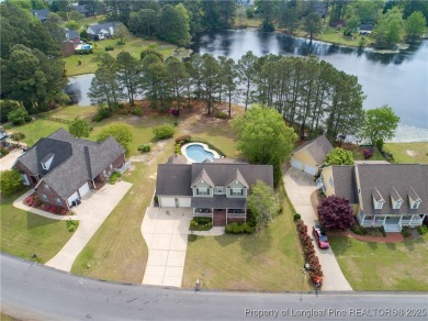 Welcome home to the highly sought after Cypress Lakes Golf on Cypress Lakes Golf Course in North Carolina - for sale on GolfHomes.com, golf home, golf lot