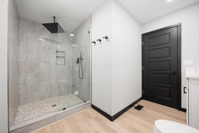 Experience the perfect blend of luxury, comfort, and lifestyle on Country Club At Muirfield Village in Ohio - for sale on GolfHomes.com, golf home, golf lot