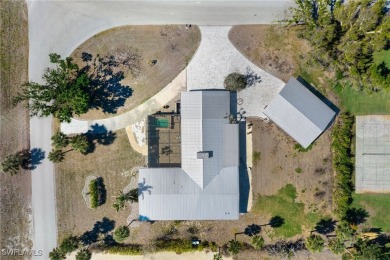 Mid-Century Modern Coastal Retreat in Cape Haze West Nestled in on Rotonda Golf and Country Club The Links Course in Florida - for sale on GolfHomes.com, golf home, golf lot