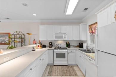 Welcome to this charming 2-bedroom, 2-bathroom first-floor condo on Myrtlewood Golf Course and Club  in South Carolina - for sale on GolfHomes.com, golf home, golf lot