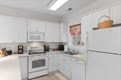 Welcome to this charming 2-bedroom, 2-bathroom first-floor condo on Myrtlewood Golf Course and Club  in South Carolina - for sale on GolfHomes.com, golf home, golf lot