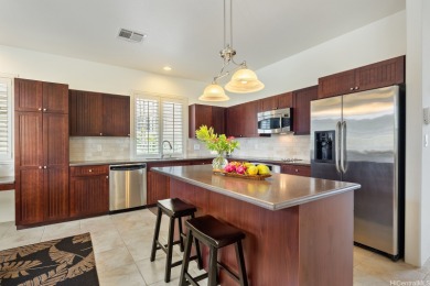 Welcome to this stunning residence nestled in the highly on Hoakalei Country Club At Ocean Pointe in Hawaii - for sale on GolfHomes.com, golf home, golf lot
