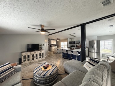 This home is located within a 55 + resort style leased land on Big Cypress Golf and Country Club in Florida - for sale on GolfHomes.com, golf home, golf lot