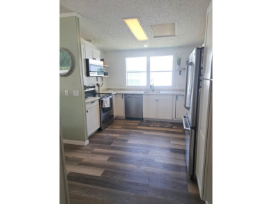 Listed by the Official Sales Team of Cypress Lakes Village on Big Cypress Golf and Country Club in Florida - for sale on GolfHomes.com, golf home, golf lot