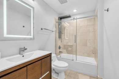 Indulge in resort-style living in this exquisite 3 bedroom, 3 on Turnberry Isle Resort and Club in Florida - for sale on GolfHomes.com, golf home, golf lot