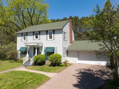 Looking for a four bedroom home just steps away from the Cloquet on Cloquet Country Club in Minnesota - for sale on GolfHomes.com, golf home, golf lot