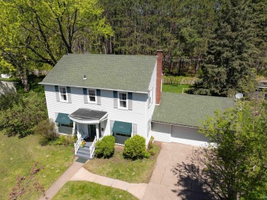 Looking for a four bedroom home just steps away from the Cloquet on Cloquet Country Club in Minnesota - for sale on GolfHomes.com, golf home, golf lot