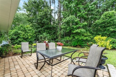 Between the rolling greens of Turkey Creek and the lush forest on Turkey Creek Golf and Country Club in Florida - for sale on GolfHomes.com, golf home, golf lot