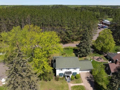 Looking for a four bedroom home just steps away from the Cloquet on Cloquet Country Club in Minnesota - for sale on GolfHomes.com, golf home, golf lot