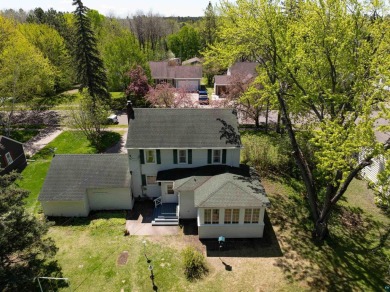 Looking for a four bedroom home just steps away from the Cloquet on Cloquet Country Club in Minnesota - for sale on GolfHomes.com, golf home, golf lot