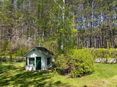 Looking for a four bedroom home just steps away from the Cloquet on Cloquet Country Club in Minnesota - for sale on GolfHomes.com, golf home, golf lot