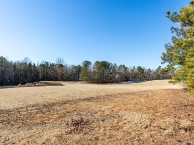 Nestled in the prestigious Olde Liberty Golf Club community on Olde Liberty Golf and Country Club in North Carolina - for sale on GolfHomes.com, golf home, golf lot