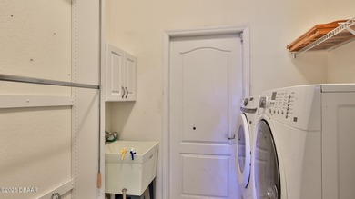 Welcome to Luxury Living in the desireable Spruce Creek Fly-In on Spruce Creek Golf Club in Florida - for sale on GolfHomes.com, golf home, golf lot