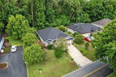 Between the rolling greens of Turkey Creek and the lush forest on Turkey Creek Golf and Country Club in Florida - for sale on GolfHomes.com, golf home, golf lot