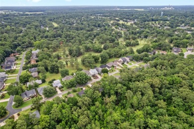 Between the rolling greens of Turkey Creek and the lush forest on Turkey Creek Golf and Country Club in Florida - for sale on GolfHomes.com, golf home, golf lot