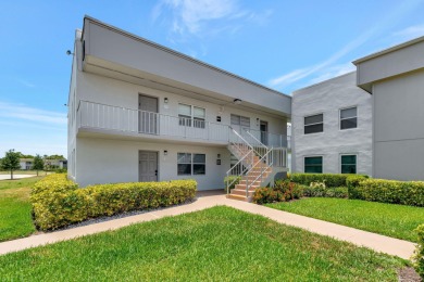 Welcome to 164 Normandy Lane, a stunning corner unit situated on on Kings Point Golf -Flanders Way in Florida - for sale on GolfHomes.com, golf home, golf lot