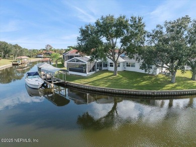 Welcome to true waterfront living in Palm Coast, positioned on a on Palm Harbor Golf Club in Florida - for sale on GolfHomes.com, golf home, golf lot