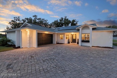 Welcome to true waterfront living in Palm Coast, positioned on a on Palm Harbor Golf Club in Florida - for sale on GolfHomes.com, golf home, golf lot