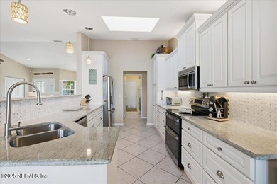 Welcome to true waterfront living in Palm Coast, positioned on a on Palm Harbor Golf Club in Florida - for sale on GolfHomes.com, golf home, golf lot