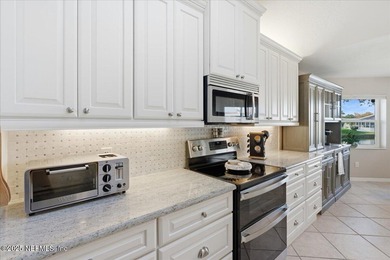 Welcome to true waterfront living in Palm Coast, positioned on a on Palm Harbor Golf Club in Florida - for sale on GolfHomes.com, golf home, golf lot