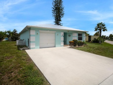 Welcome to this beautifully maintained CBS home located in a on Spanish Lakes Golf Village in Florida - for sale on GolfHomes.com, golf home, golf lot