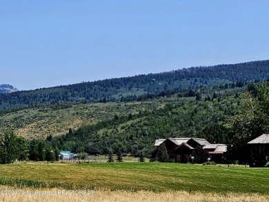 Stunning custom home site overlooking Hole 7 of the Hale Irwin on Teton Reserve in Idaho - for sale on GolfHomes.com, golf home, golf lot