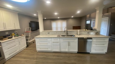 Beautifully Updated 4 bedroom 3 bath home located on large lot on Lakes of the Four Seasons Country Club in Indiana - for sale on GolfHomes.com, golf home, golf lot