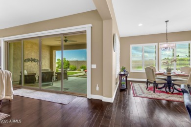 This beautifully maintained ENDEAVOR home on a CORNER LOT on Poston Butte Golf Club in Arizona - for sale on GolfHomes.com, golf home, golf lot