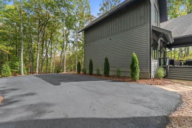 Nestled within the private, gated confines of Chinquapin, a 2 on Natures Walk At Chinquapin in North Carolina - for sale on GolfHomes.com, golf home, golf lot