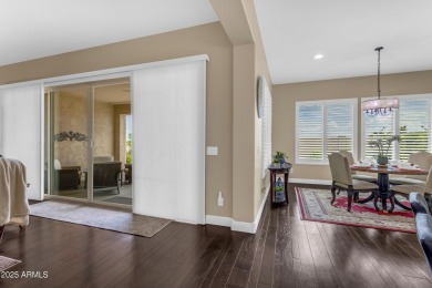 This beautifully maintained ENDEAVOR home on a CORNER LOT on Poston Butte Golf Club in Arizona - for sale on GolfHomes.com, golf home, golf lot