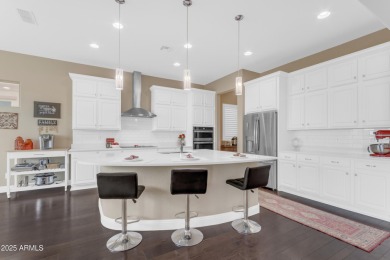 This beautifully maintained ENDEAVOR home on a CORNER LOT on Poston Butte Golf Club in Arizona - for sale on GolfHomes.com, golf home, golf lot