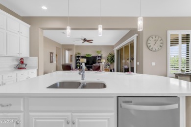 This beautifully maintained ENDEAVOR home on a CORNER LOT on Poston Butte Golf Club in Arizona - for sale on GolfHomes.com, golf home, golf lot