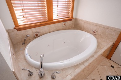 A bright and inviting custom-built home in the classic Old Nags on Nags Head Golf Links in North Carolina - for sale on GolfHomes.com, golf home, golf lot