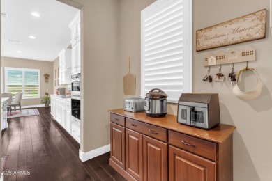 This beautifully maintained ENDEAVOR home on a CORNER LOT on Poston Butte Golf Club in Arizona - for sale on GolfHomes.com, golf home, golf lot