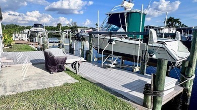 Welcome to your dream Waterfront home in Old Bridge Village! on Riverbend Golf and Country Club in Florida - for sale on GolfHomes.com, golf home, golf lot