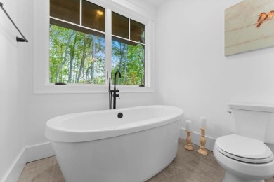 Nestled within the private, gated confines of Chinquapin, a 2 on Natures Walk At Chinquapin in North Carolina - for sale on GolfHomes.com, golf home, golf lot