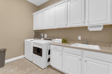 This beautifully maintained ENDEAVOR home on a CORNER LOT on Poston Butte Golf Club in Arizona - for sale on GolfHomes.com, golf home, golf lot