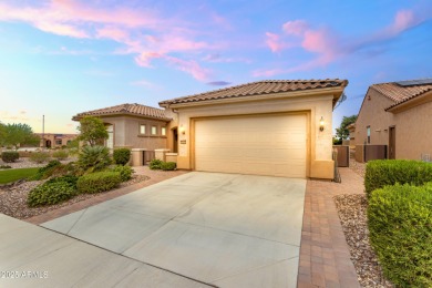 This beautifully maintained ENDEAVOR home on a CORNER LOT on Poston Butte Golf Club in Arizona - for sale on GolfHomes.com, golf home, golf lot